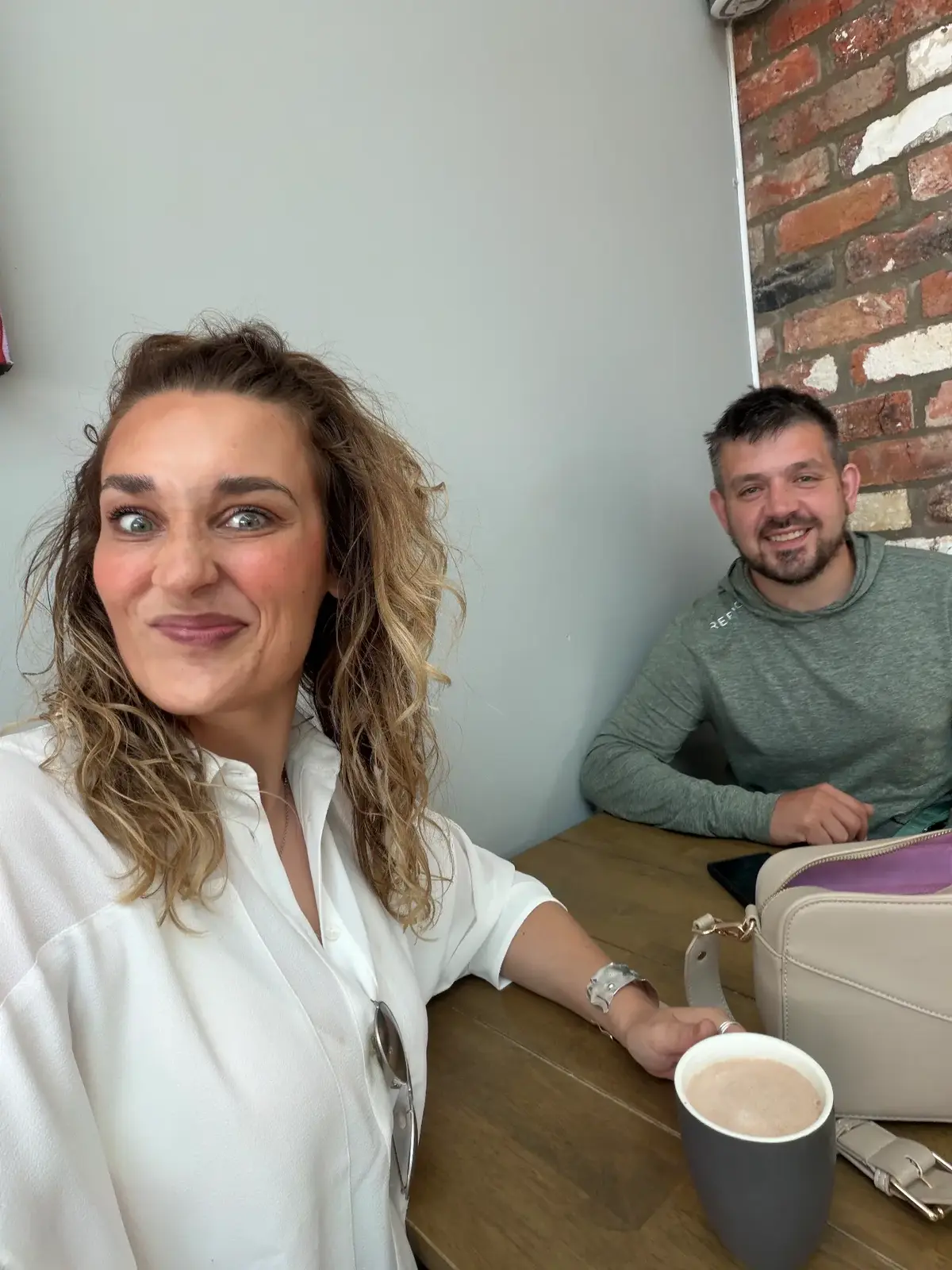 Jem and Josh, the couple behind Vaultd, having a coffee together